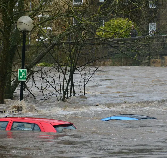 Flooded street with partially submerged cars